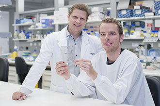 Dr Marc Pellegrini and Dr Greg Ebert in a laboratory