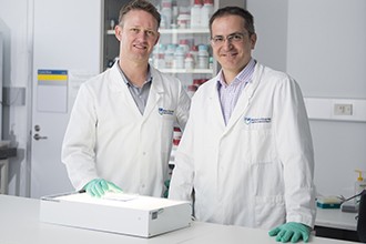 Dr Peter Czabotar and Dr Guillaume Lessene in a laboratory