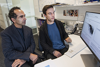 Researchers looking at computer