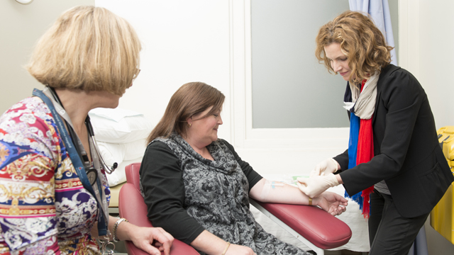 Staff taking a blood donation