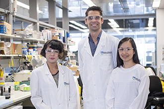 Smiling researchers