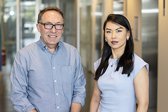 Researchers smiling