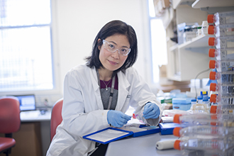 Associate Professor Jeanne Tie in a laboratory