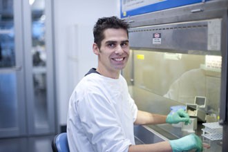 Daniel Gray at fume hood in lab