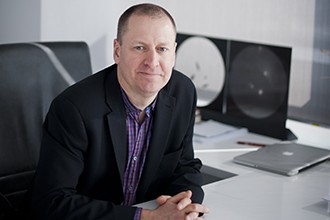 Professor Doug Hilton at desk