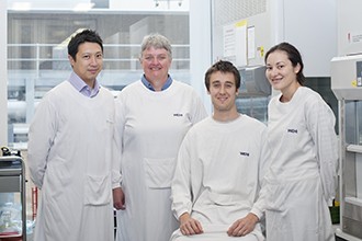 Dr Jason Tye-Din, Ms Cathy Pizzey, Mr Adam Girardin, and Dr Melinda Hardy in a lab