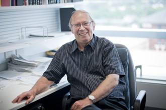 Jerry Adams sitting at desk