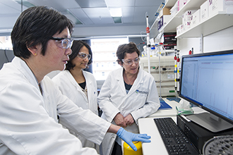 Researchers looking at computer