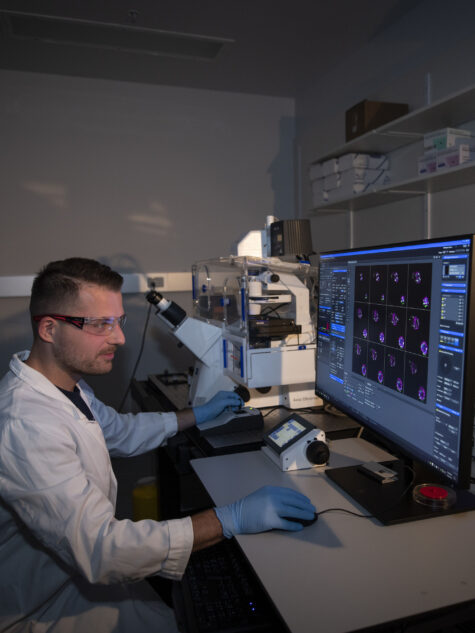 WEHI scientist with imaging instrument
