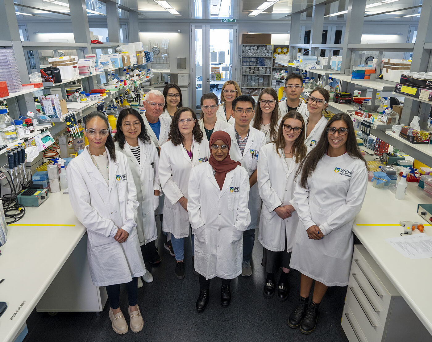 Photograph of the Strasser team in a laboratory