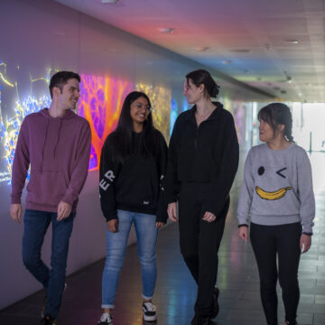 Students in discussion touring the institute