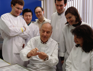 Don Metcalf in the lab with colleagues