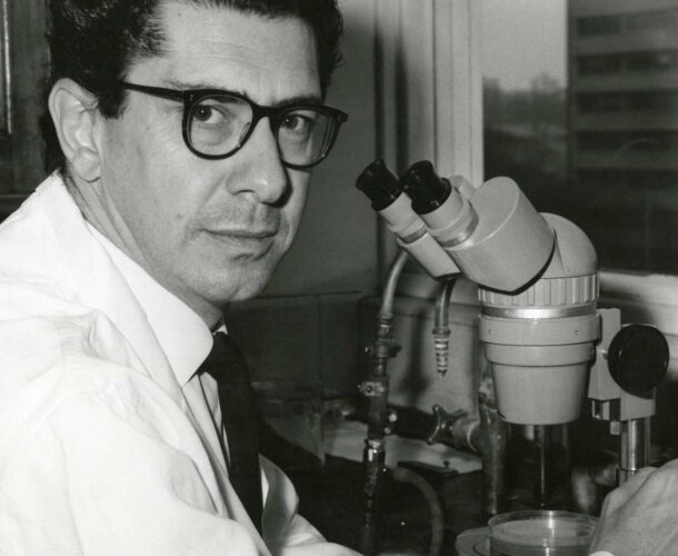 Jacques Miller with microscope