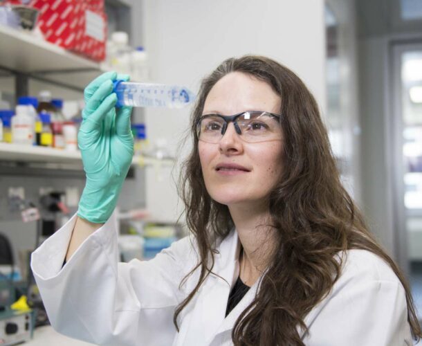 Associate Professor Marnie Blewitt studying in a lab