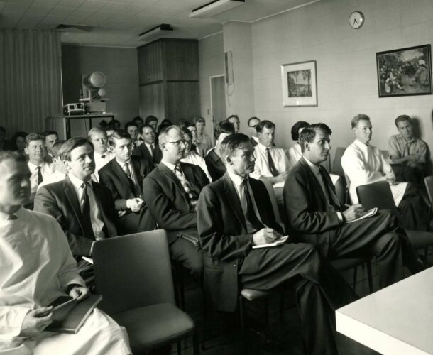 A staff meeting in 1957