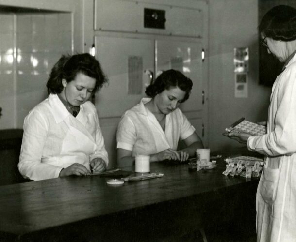 Institute staff Coralie Potter, Marie MacPherson and Fanny Williams checking blood grouping and recording blood groups.