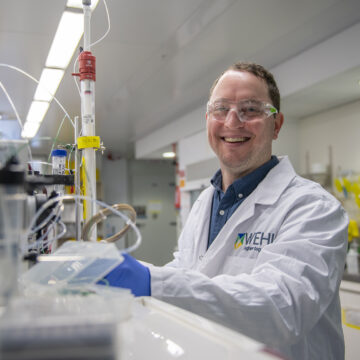 Michael Roy photographed working in a laboratory