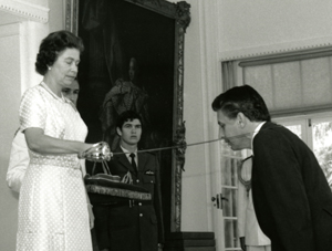 Her Majesty Queen Elizabeth II knighting Sir Gustav Nossal