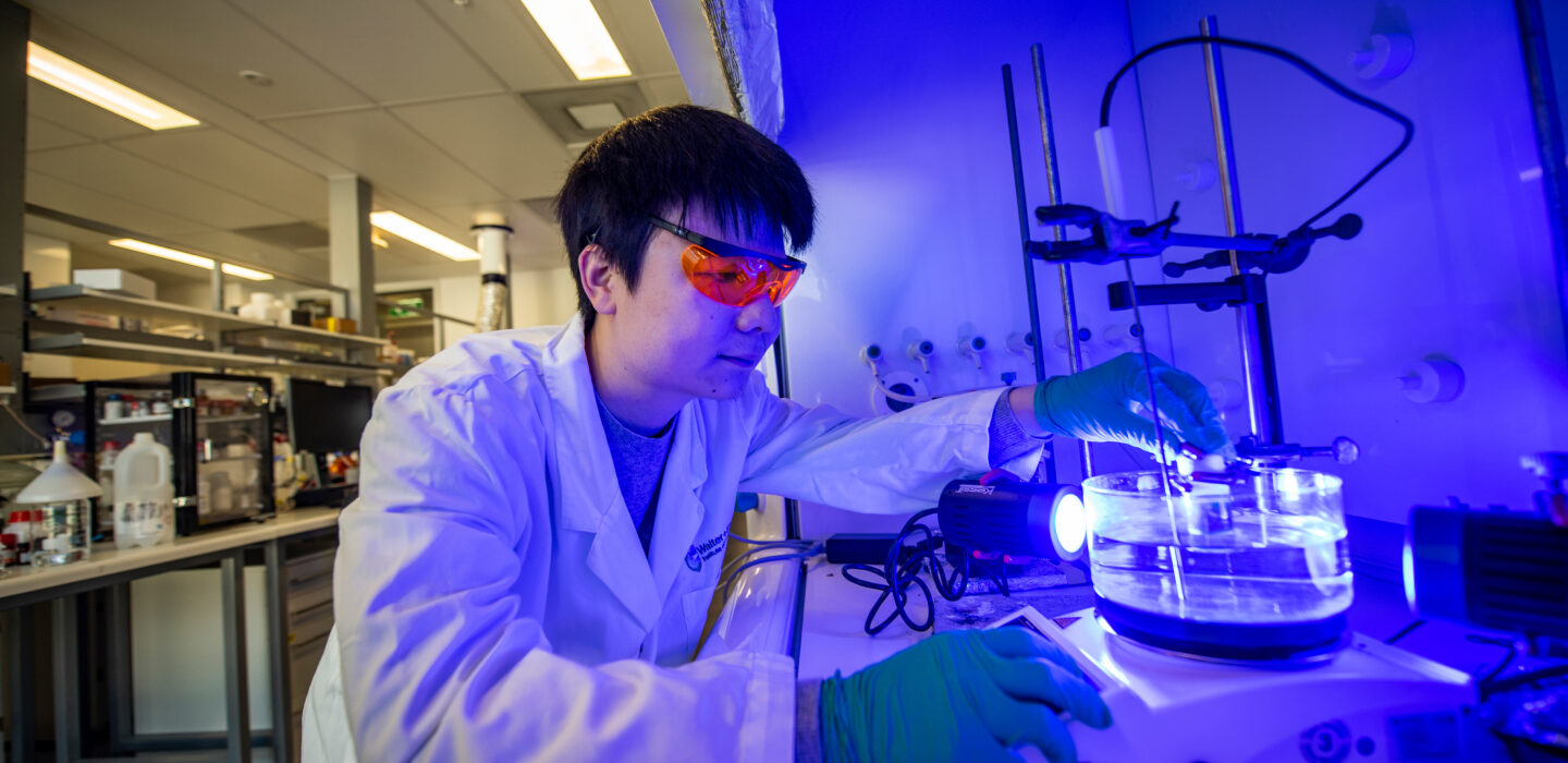 Resarcher in blue light