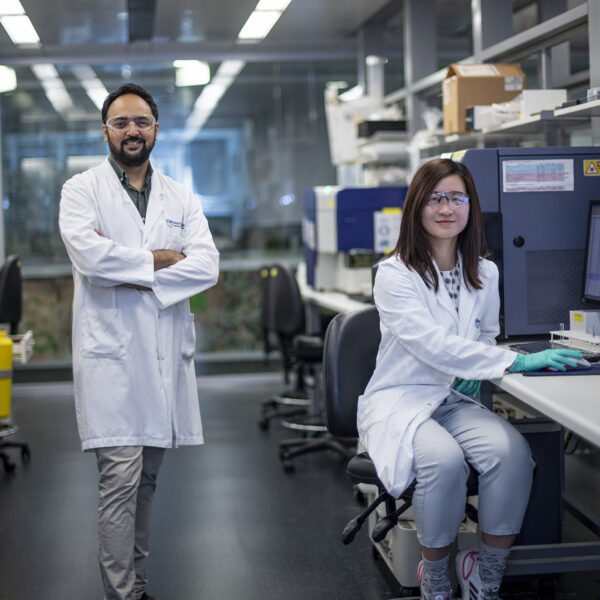 Shalin Naik and Dawn Lin photographed in a laboratory