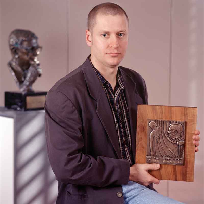 Professor Doug Hilton with the Burnet Prize in 1997