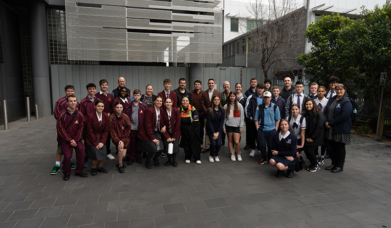 Thane Garvey - Wurundjeri Traditional Owner (left), Corey Tutt OAM (middle), Joshua Waters (right) and students in the DeadlyScience Pathways Program.