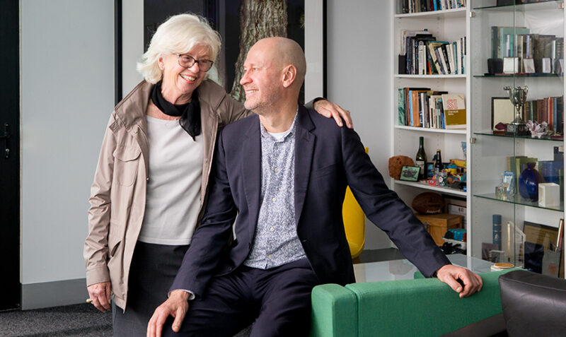 Photo of philanthropist Pamela Galli with Doug Hilton in his office