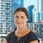 Photo of Michelle Kleynhans with a city background