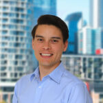 Photo of Nicholas Liau with a city background