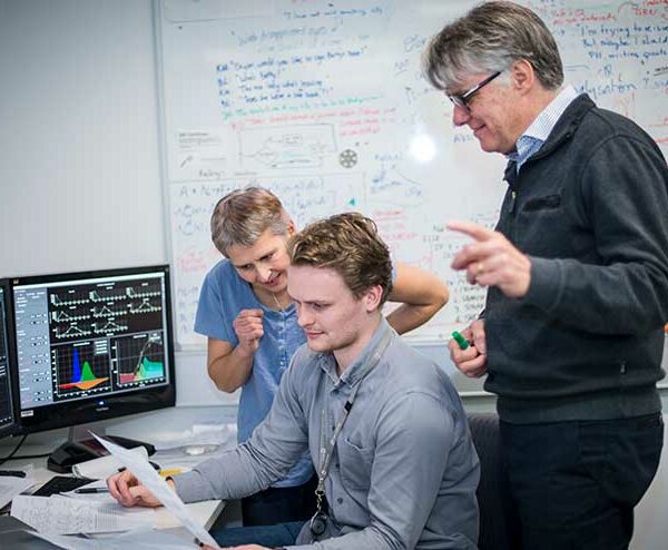 Dr Susanne Heinzel, Mr Miles Horton and Professor Phil Hodgkin discussing work in the office