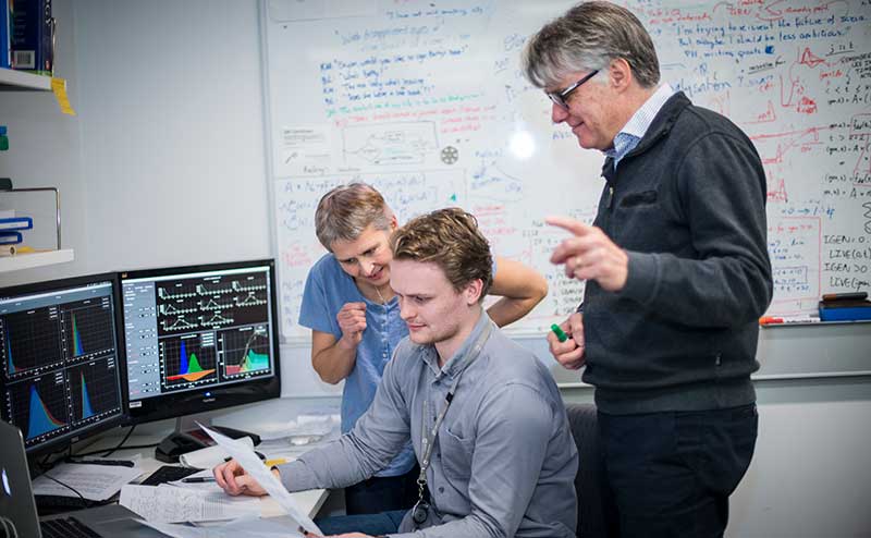 Dr Susanne Heinzel, Mr Miles Horton and Professor Phil Hodgkin discussing work in the office