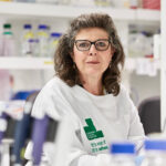 Professor Michelle Haber photographed at a laboratory bench