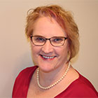 Photo of Christine Diamond smiling at the camera