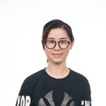 Emma Pan wearing a black t-shirt with grey and white writing