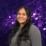 Head-and-shoulders photo of Ishrat Zaman with a purple background