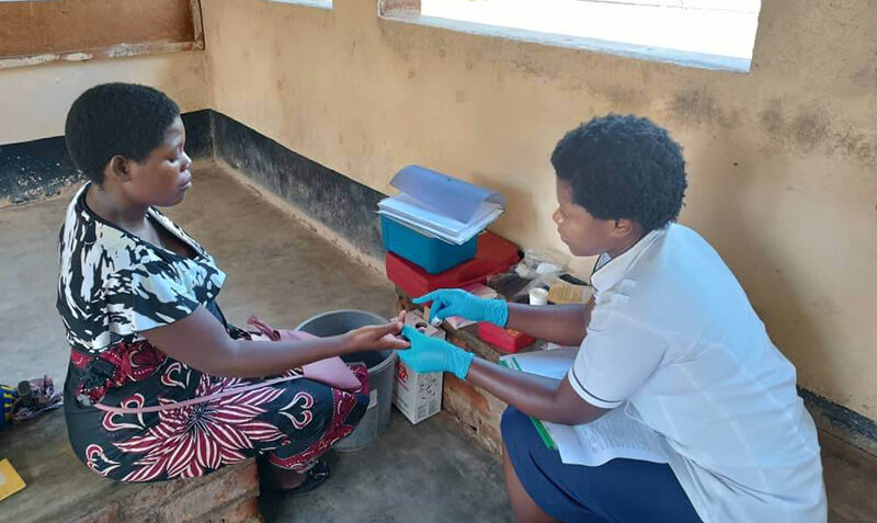 A study nurse screens a pregnant participant for anaemia by collecting a blood sample for haemoglobin. Credit: Elisabeth Mamani-Mategula, the Training and Research Unit of Excellence (Malawi).