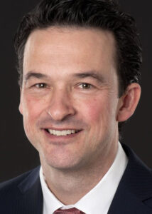 Head and shoulders photo of A/Prof Peter Hughes