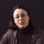 Photo of Glenda Halliday with a plain black background
