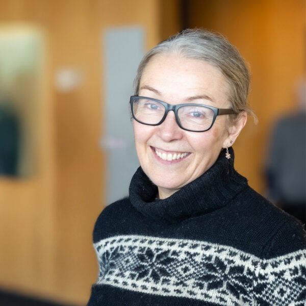 Jennifer Henry is photographed smiling at the camera